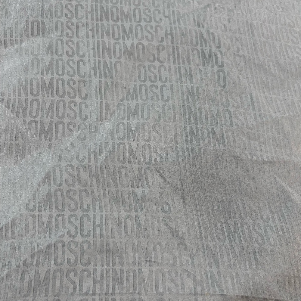Moschino Baby Blue 100% silk scarf  9 x 9 inches